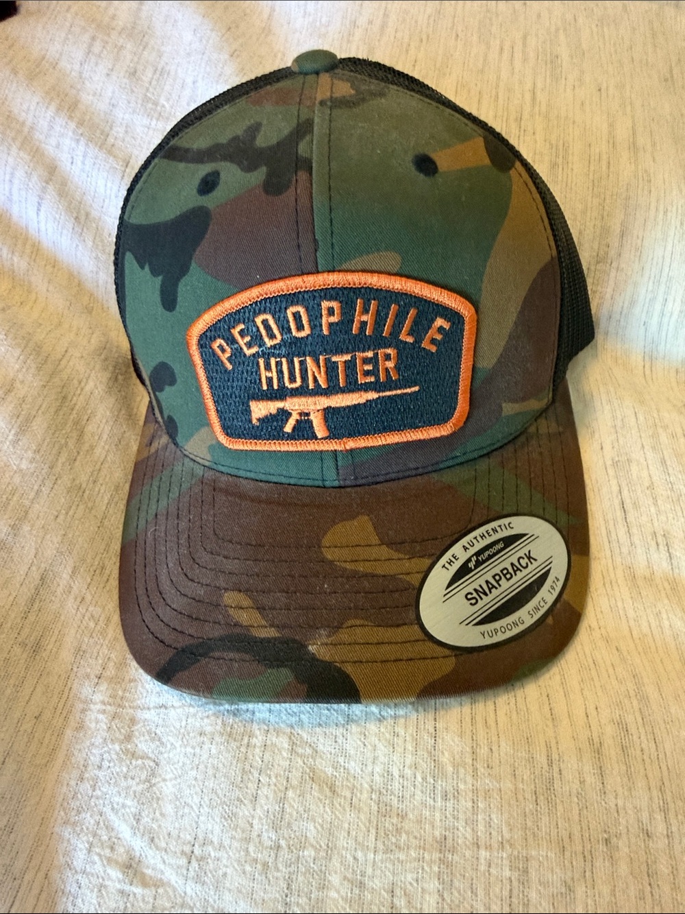 Hunter Camouflage Snapback Hat - Orange Patch